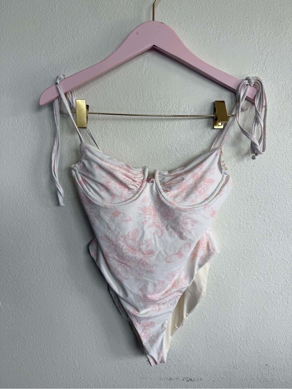 Dippin' Daisy's White and Light Pink Floral One-Piece Swimsuit